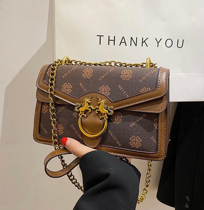 Discover Effortless Elegance: Imported PU Leather Sling Bag